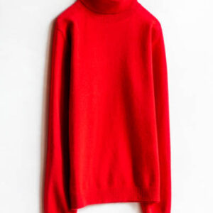 Red wool sweater hanging on clothes hanger on white background.close up.
